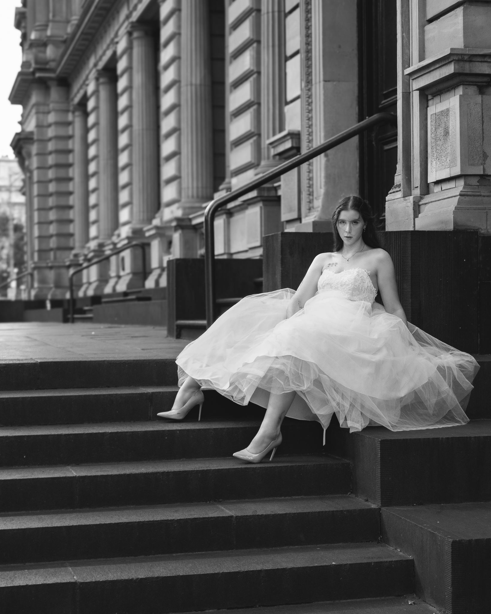 Editorial bridal portrait — Melbourne heritage architecture, couture dress reveal
